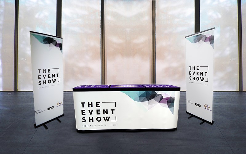 MEA & The Event Show: Fully Branded Promotional Tables and Pull-Up Banners, designed and manufactured by Tables By Design.