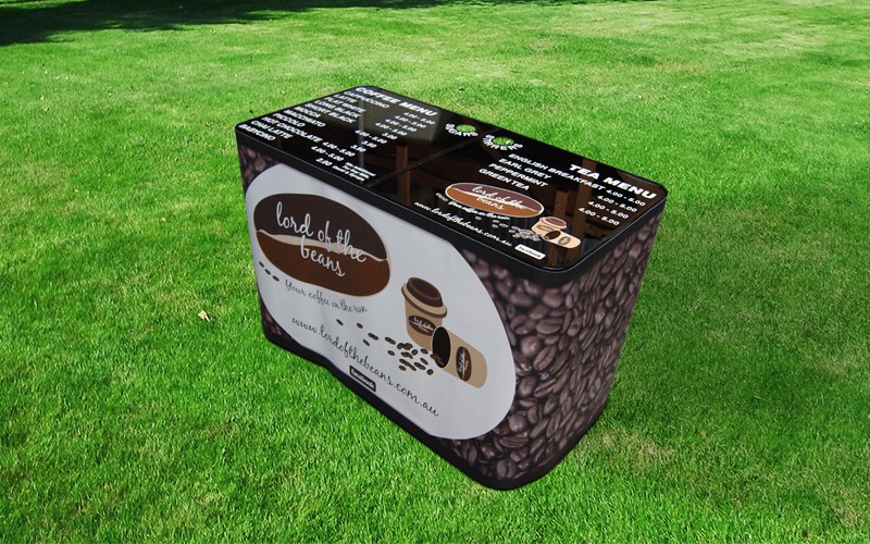 Lord of the Beans: Customised and Branded All-Weather Acrylic 2-Panel Table with Table-Top Decal and Vinyl Valance, designed and manufactured by Tables By Design.