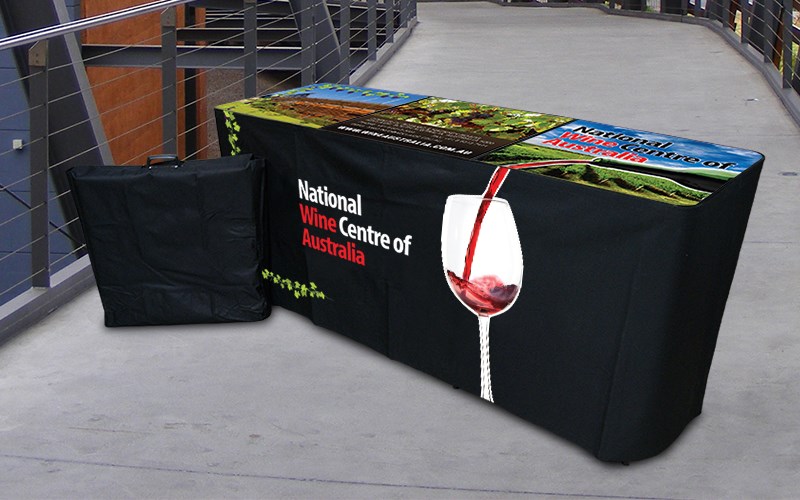 National Wine Centre of Australia: Branded 3-Panel Table and Black Canvas Valance, designed and manufactured by Tables By Design.