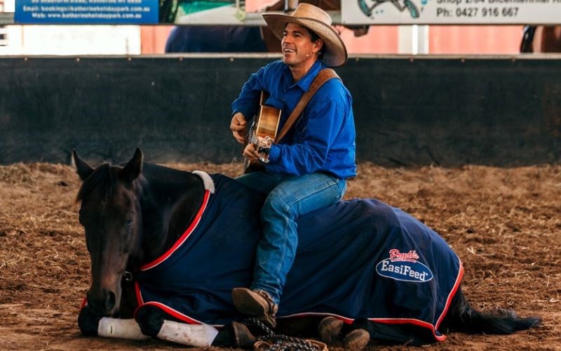 Tom Curtain is a multiple award-winning singer/ songwriter as well as a horse and dog trainer