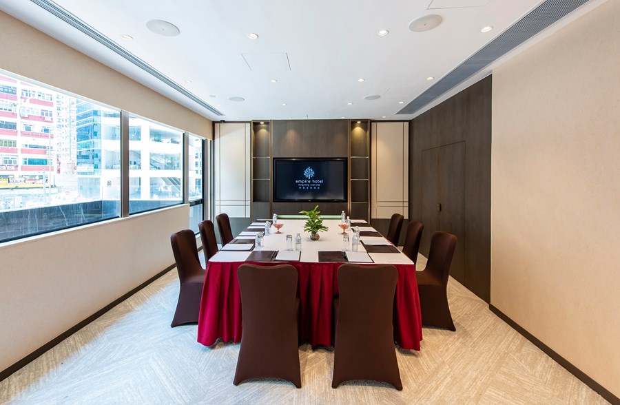 Empire Room 3 in boardroom style.  Newly-renovated and equipped with a touch-screen TV panel and state-of-the-art AV system